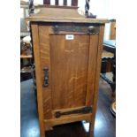 A 15 1/2" early 20th Century quarter sawn oak pot cupboard with Arts and Crafts style strap hinges