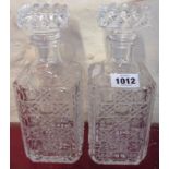 Two moulded glass decanters