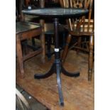 A 17" diameter mahogany pedestal wine table, set on turned pillar and moulded tripod base - repair
