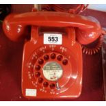 A vintage rotary dial telephone