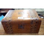 A 12" Victorian mahogany cushion shaped work box with two bands of Tunbridge style decoration and