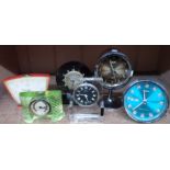 Two vintage rhythm mechanical alarm clocks - sold with four other small timepieces - various