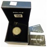 A Police gentleman's black finish quartz wristwatch - boxed with paperwork