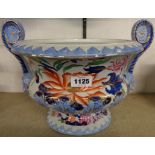 A large Warranted Ironstone footed bowl with ornate handles - no lid