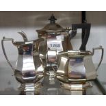 A Mappin & Webb silver plated three piece tea set of faceted baluster design
