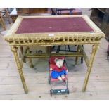 A 30" Victorian gold and russet velvet upholstered centre table with decorative piping and tassel