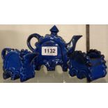 An unnamed pottery miniature tea service of abstract geared design, numbered 1152 and Registration