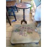 A Regency mahogany framed footstool with floral tapestry upholstery and reeded squat bun feet - sold