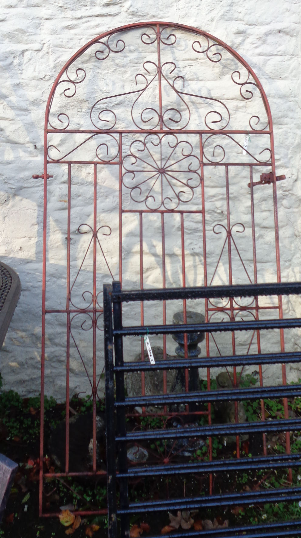 A 35" wrought iron garden gate