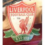 A reproduction painted cast iron Liverpool football sign