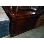 A 4' Victorian mahogany chiffionier with a blind frieze drawer, flanking capitals and a pair of