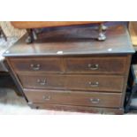A 3' 9" Edwardian mahogany and strung chest of two short and two long graduated drawers, set on