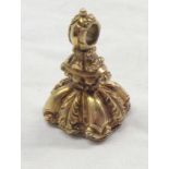 A Victorian gilt metal fob seal with chalcedony intaglio family crest