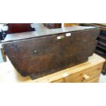 A 35" late 18th Century oak lift-top carriage top-box with original escutcheon and replacement strap