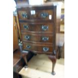 A 16" reproduction mahogany serpentine front bedside chest, set on cabriole legs with pad feet - for