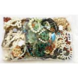 A bag containing a quantity of good quality costume jewellery necklaces