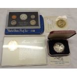 A cased 1976 silver commemorative coin for the Concorde first passenger flight from London to
