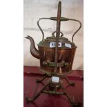 A copper and brass spirit kettle