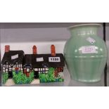 A Devon Moor lidded cottage and candy vase