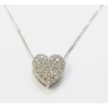 A marked 375 white metal pendant necklace with diamond encrusted heart shaped setting