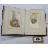 A small Victorian photograph album containing contemporary family portraits - one bracket a/f
