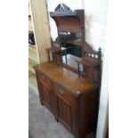 A 3' 11" Edwardian walnut sideboard with bevelled mirror set raised back and flanking shelves over