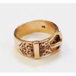 A hallmarked 9ct. rose gold buckle pattern ring