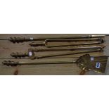 A brass companion set