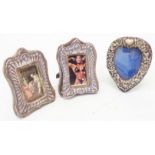 A pair of small silver fronted photograph frames - sold with another - various condition