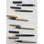 A Parker fountain pen with 12k rolled gold case and 14k nib, another Parker, three Sheaffer and