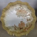 A late 19th - early 20th Century Doulton Burslem plate of scalloped design with rabbits and