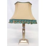 A 12" silver table lamp with engine turned finish and stepped base - London 1937 - with original