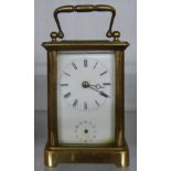 An early 20th Century brass cased carriage clock with eight day alarm movement - alarm dial hand