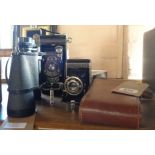 A cased Kodak Pocket 1A bellows camera, an Agfa Billy Record, and a Chinon BF200DB - sold with a