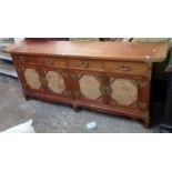 A 6' 8" modern Oriental hardwood faced dresser base with typical moulded decoration to ends of