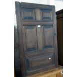 An antique stained oak furniture panel with pegged and moulded decoration - 26" X 3' 7 1/2"