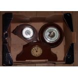 Two small timepieces - sold with an aneroid wall barometer with visible works