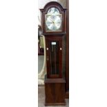 A late 20th Century mahogany cased grandmother clock, the moon phase arched dial marked for