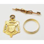 A hallmarked 9ct. gold fob and wedding band - sold with a marked 9ct. bar brooch
