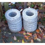 A pair of polished granite garden light holders