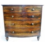 A 3' 6 1/2" 19th Century flame mahogany veneered bow front chest two short and three long