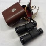 A pair of Carl Zeiss Notarem 10X40 binoculars in leather case - one focus wheel a/f
