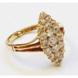 A hallmarked 18ct. gold diamond encrusted marquise panel ring - with copy of valuation certificate