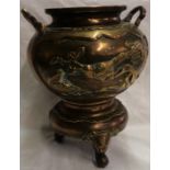 An Oriental bronzed pedestal bowl - lid missing