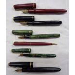 Three Conway Stewart fountain pens with 14K nibs comprising Dinkie 560 in green marble, 28 in