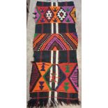 Two Moroccan handmade wool runners with vibrant geometric patterns on black ground - 22" X 12' 4" (