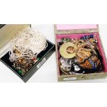 Two small boxes containing assorted costume jewellery