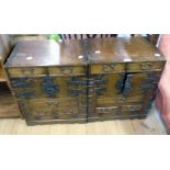 A pair of 18" 20th Century Oriental stained hardwood and decorative metal bound bedside chests, each