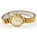 A vintage ROC lady's 9ct. gold cased wristwatch with seventeen jewel movement and plated strap