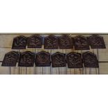 A set of twelve modern cast iron reproduction herb labels